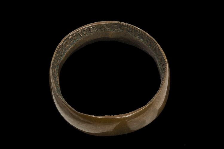 Wedding band made from a penny coin. Inscriptions on inside of band.