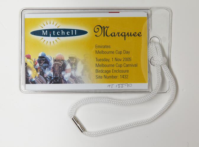 Rectangular clear plastic pocket with white cord. Contains yellow and black card with racing horses.