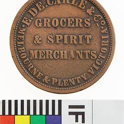Token - 1 Penny, E. De Carle & Co, Grocers & Spirit Merchants, Melbourne & Plenty, Victoria, Australia, circa 1853