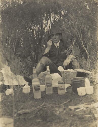 Digital Photograph - Man Sitting at Picnic, in Tea Tree Scrub, Saint Margaret Island, 1912