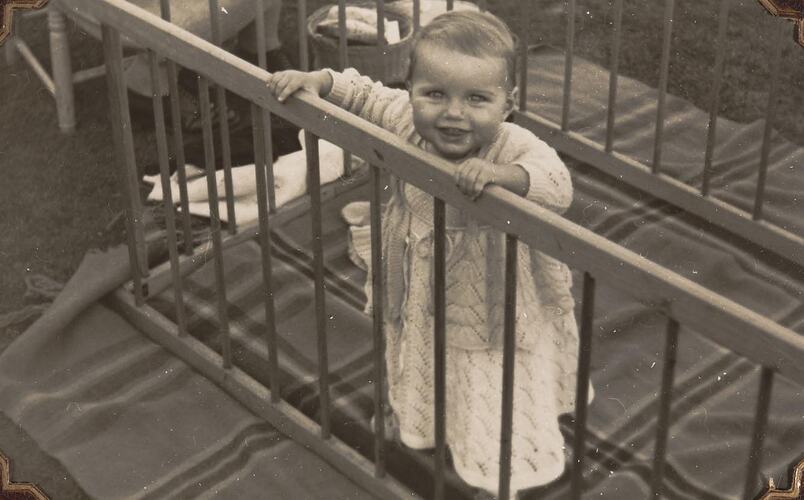 Digital Photograph - Baby in Wooden Playpen on a Rug, Backyard, Oakleigh, 1946