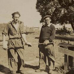 Digital Photograph - Two Men in Gauntlets Holding Rod, House Building Site, Newport, 1951
