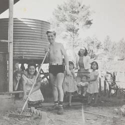 Digital Photograph - Family Gardening in Backyard, near Water Tank, Ringwood East, 1956