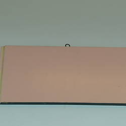 Painted board showing sample of colour pink.
