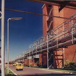 Photograph - Kodak Australasia Pty Ltd, View of Gantry System & Service Road at the Kodak Factory, Coburg, 1964