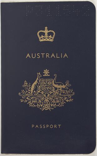 Blue passport cover with gold stamped coat of arms and text 'Australia Passport. 'B' in top left corner.