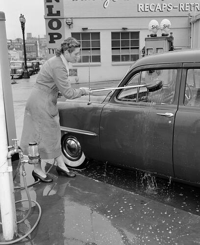 Negative - Woman Washing a Car, Victoria, May 1954