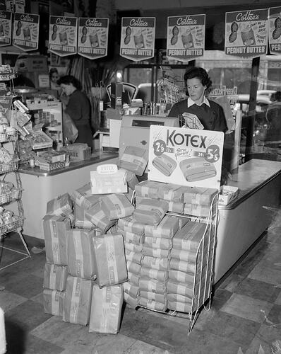 Worker at Cash Register in Supermarket, Melbourne, Victoria, 1955