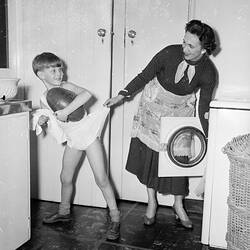 Woman & Boy in Laundry, Melbourne, Victoria, 1956