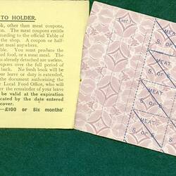 Open ration book showing coupons.
