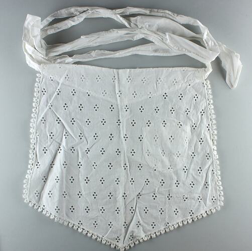 White Broderie Anglaise cotton apron without a bib.