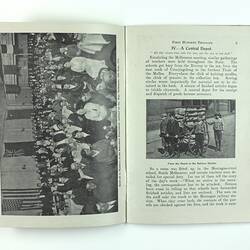 Open booklet on faded green paper with black printed text, photograph of crowd and of boys with a cart.