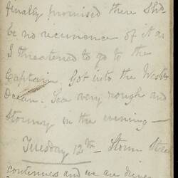Open diary with handwritten text on discoloured worn page.