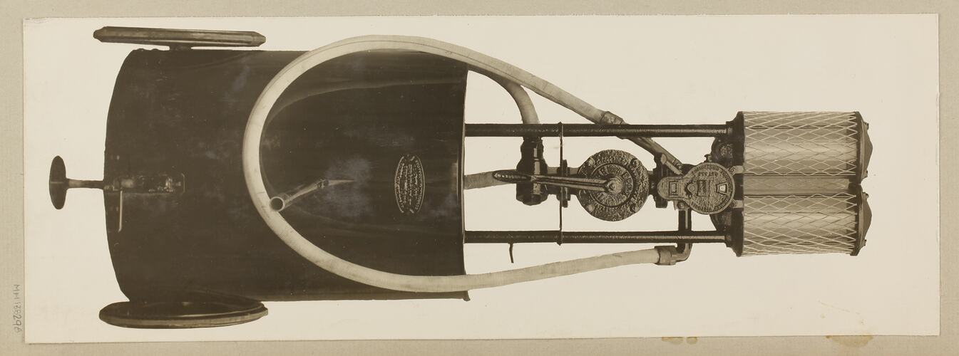 Monochrome photograph of a portable petrol measure.