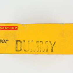 Side of film box stamped 'Dummy'.