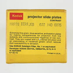 End of yellow box with product sticker.