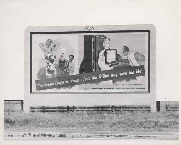 Kodak billboard in field.