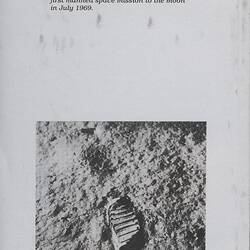 Silver book cover with photograph.