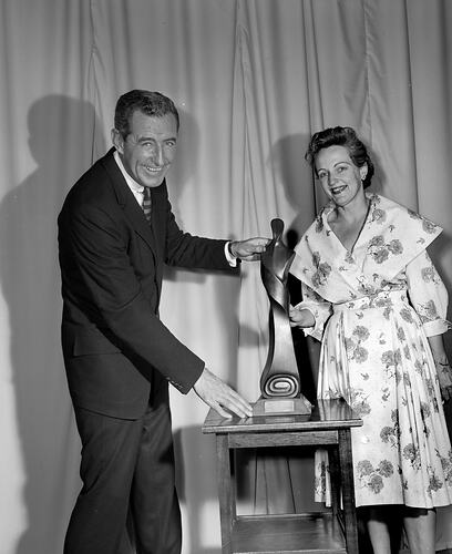 Australian Wool Board, Pair Standing with a Trophy, Flemington, Victoria, 27 Nov 1959