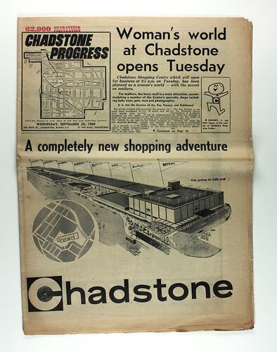 Front of newspaper with drawing of shopping centre