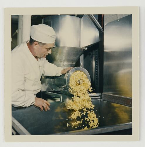 Slide 144, Worker Mincing Hardened Emulsion, Kodak Factory, Coburg, 'Extra Prints of Coburg Lecture' album, circa 1960s