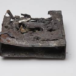 Fire afffected melted computer hard drive.