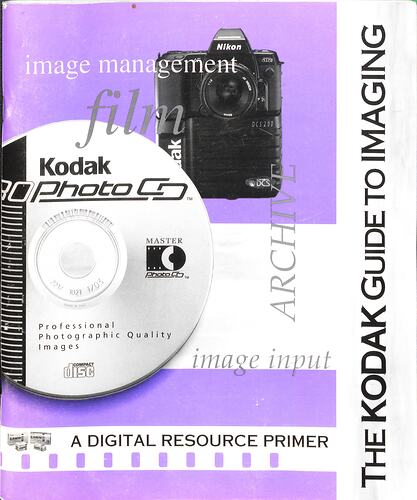 Cover page with CD and camera on a purple background.