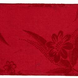 Red silk pouch or case.
