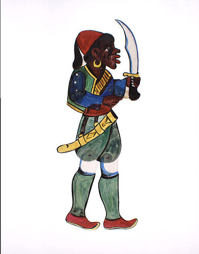 Two dimensional acrylic puppet of an African man wearing green clothes, a red cap and shoes, holding a sword.