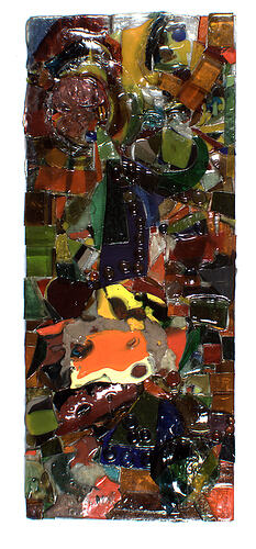 Colourful rectangular glass sculpture.