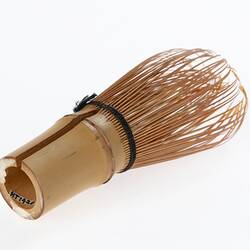 Bamboo tea whisk. Hollow bamboo handle. Whisk is two layers of finely spliced and curved bamboo.