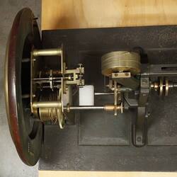 Overhead view of clock showing mechanism.