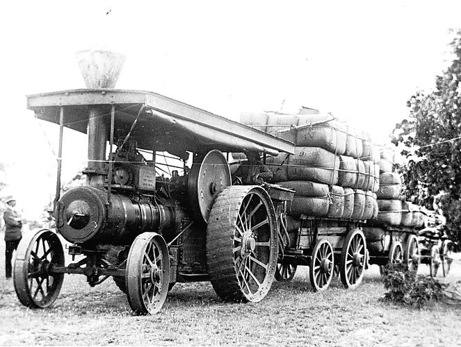 [A steam traction engine hauling a load of wool bales to the railway at Coleraine, Balmoral, 1910.]