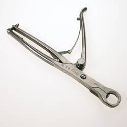 Silver surgical tool.
