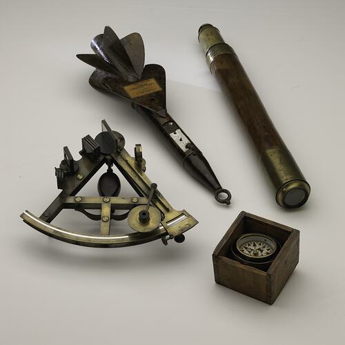 Navigational instruments, sextant, nautical telescope, marine compass and ship's log