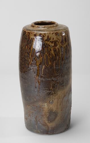 Vase with brown and gold detail.