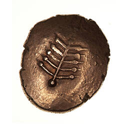 Coin, irregular, branched emblem with five arms either side of central stalk, beads on the end of each branch.