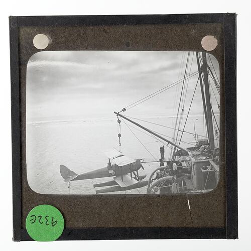 Lantern Slide - Gipsy Moth A7-55 on the Lifting Hook, Ross Sea, Ellsworth Relief Expedition, Antarctica, 12 Jan 1936