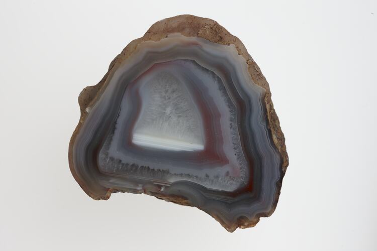 Pale blue and cream agate with pink highlights.