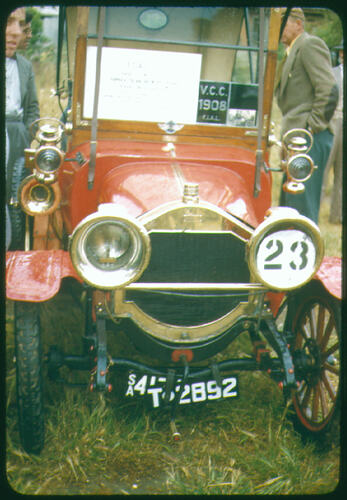 Front view of vintage car on display