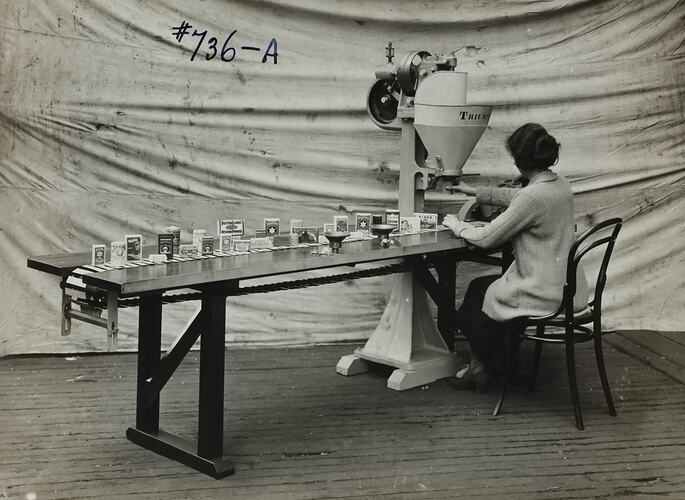 Photograph - Schumacher Mill Furnishing Works, Woman Operating Triumph Filling Machine, Port Melbourne, Victoria, circa 1940s