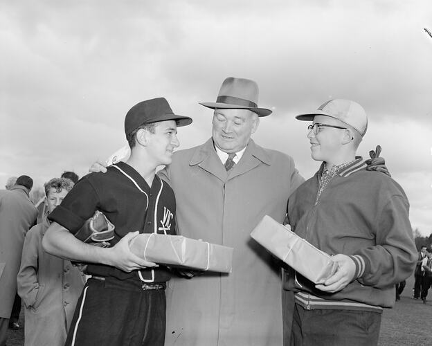 Man with Two Baseball Players, Olympic Park, Melbourne, Victoria, 1958