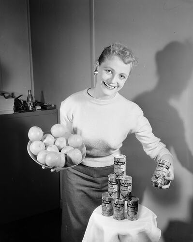 Woman with Orange Juice Promotional Display, Melbourne, Victoria, 1956