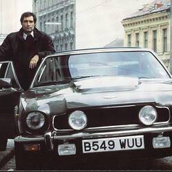 Postcard - James Bond (Timothy Dalton) with Aston Martin Car, 1987