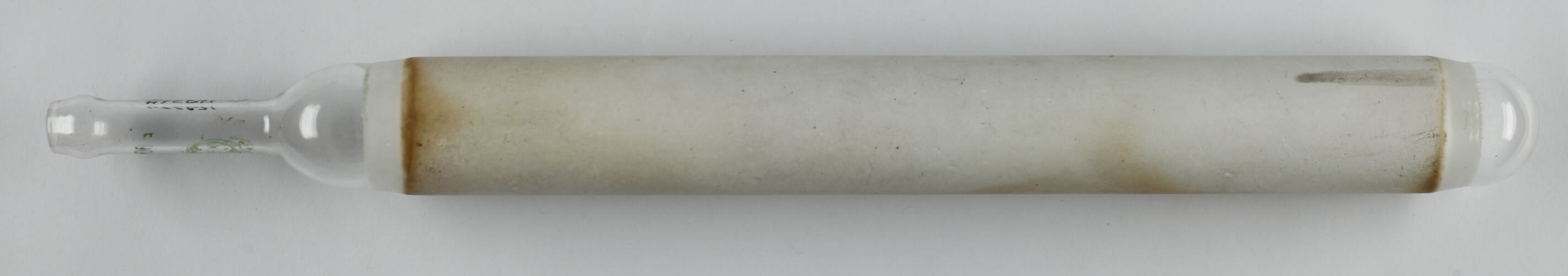 Long glass and ceramic cylinder.