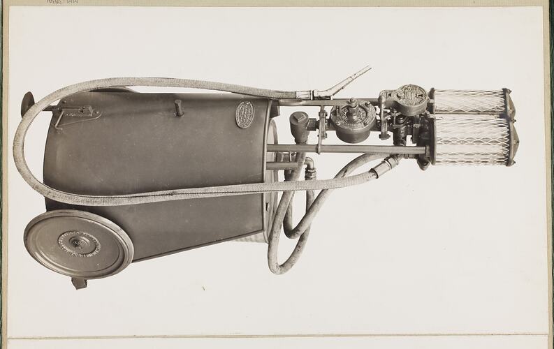 Monochrome photograph of a portable petrol measure.
