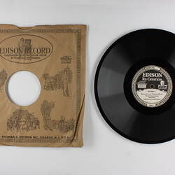 Black Edison record disc and paper sleeve.