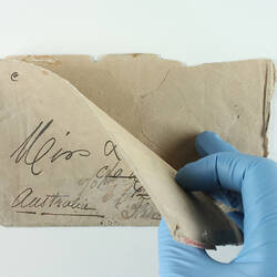 Front of hand-written envelope showing blank insides.