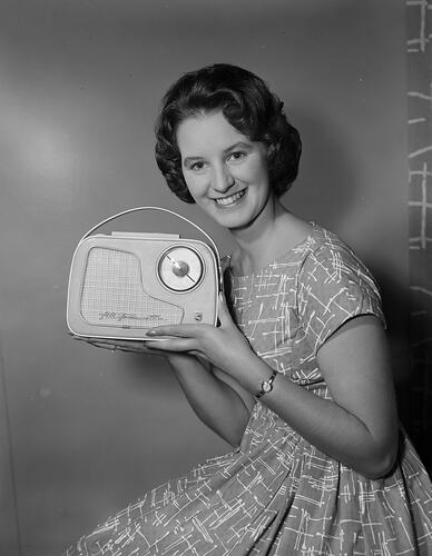 Philips Electrical Industries, Woman Holding a Portable Radio, Victoria, 24 Feb 1960