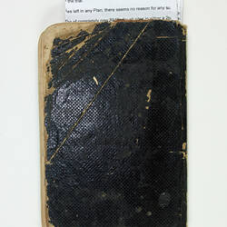 Back cover of black notebook.